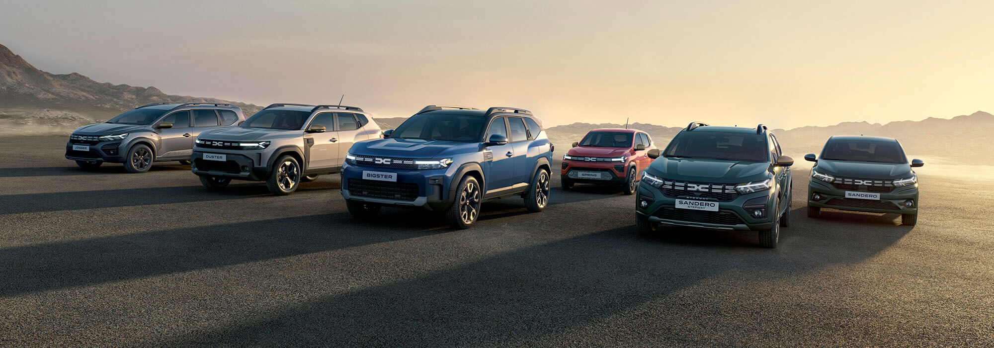 Dacia Flotte vor einem Sonnenaufgang